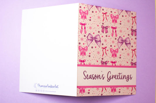 Season's Greetings Pink Winter Holiday Bows Holiday Greeting Card