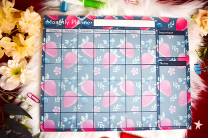 Monthly planner with heart designs on a floral background