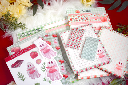 Stationery items including notepads, stickers, bookmarks, and planners on a red background with decorative elements.