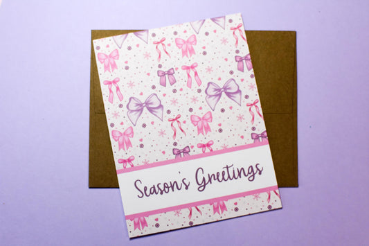 Season's Greetings Pink Winter Holiday Bows Holiday Greeting Card