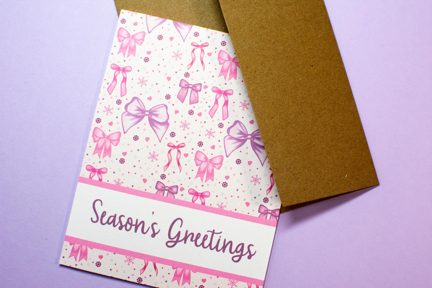 Season's Greetings Pink Winter Holiday Bows Holiday Greeting Card