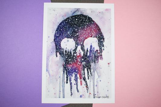 Watercolor painting of a skull with a colorful gradient on a white background